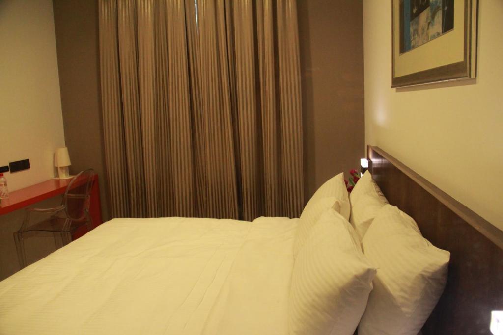 Aparthotel Cove D'Arena Singapur Habitación foto