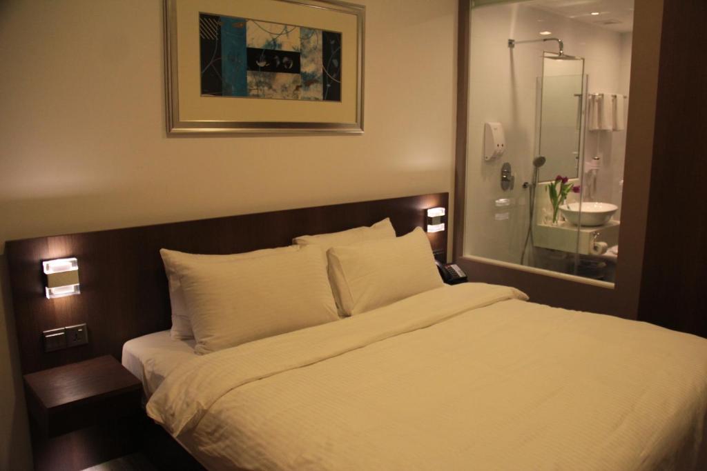 Aparthotel Cove D'Arena Singapur Habitación foto