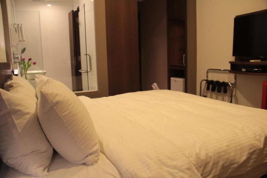 Aparthotel Cove D'Arena Singapur Habitación foto
